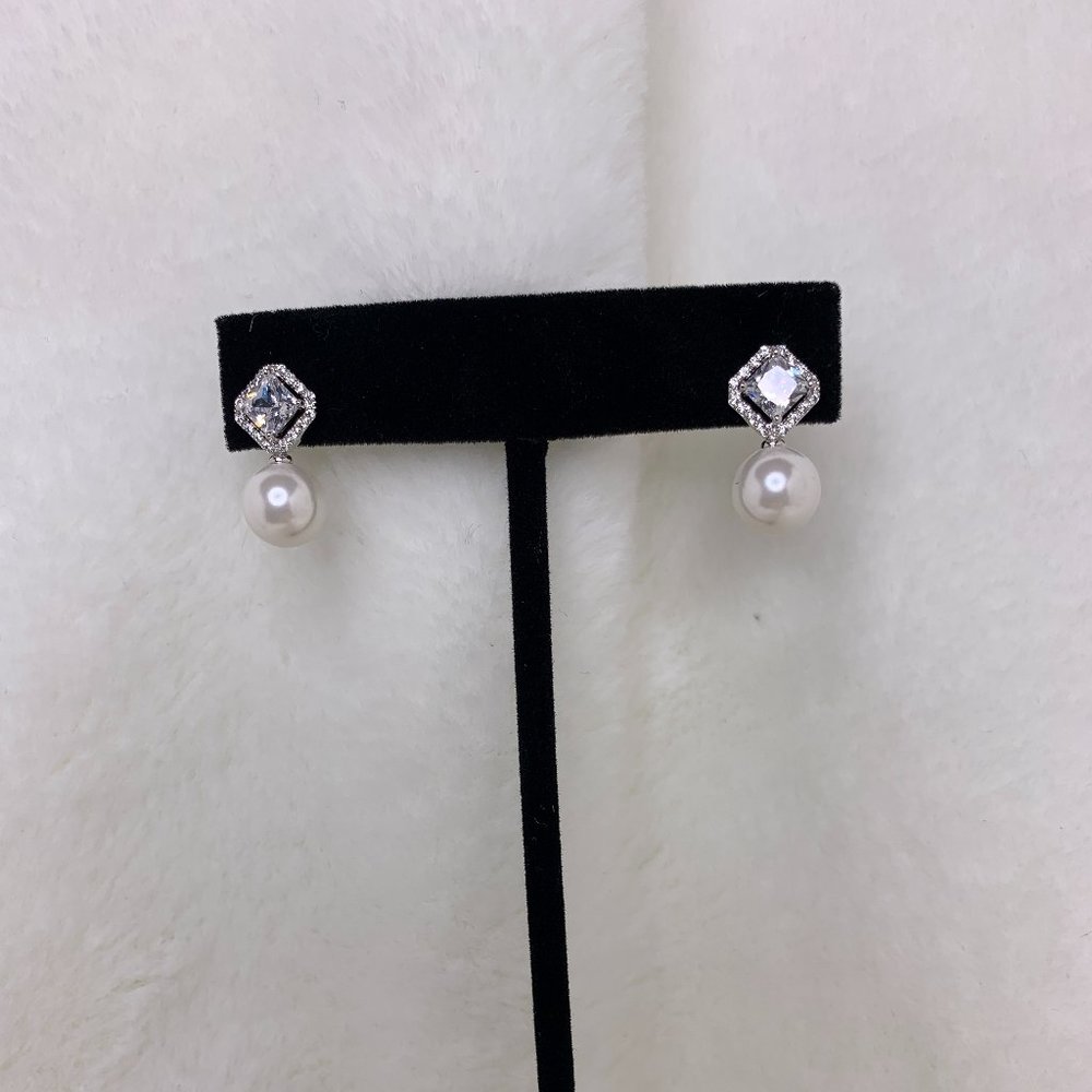 Dangling Drop Pearl and Cubic Zirconia pierced Ear